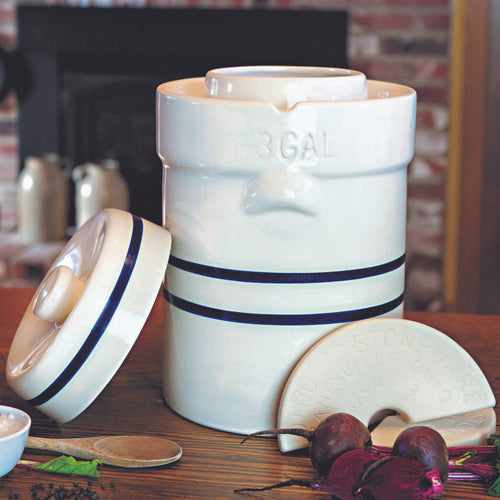 Handcrafted 3-gallon natural stoneware fermenting crock with classic blue stripes and a built-in water-sealed gutter, ideal for food preservation and homesteading in USA-made collections.