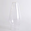 Clear glass oil lamp chimney with a smooth top and tapered design, handcrafted for use in lamps and lighting, parts and accessories, chimneys and globes collections.