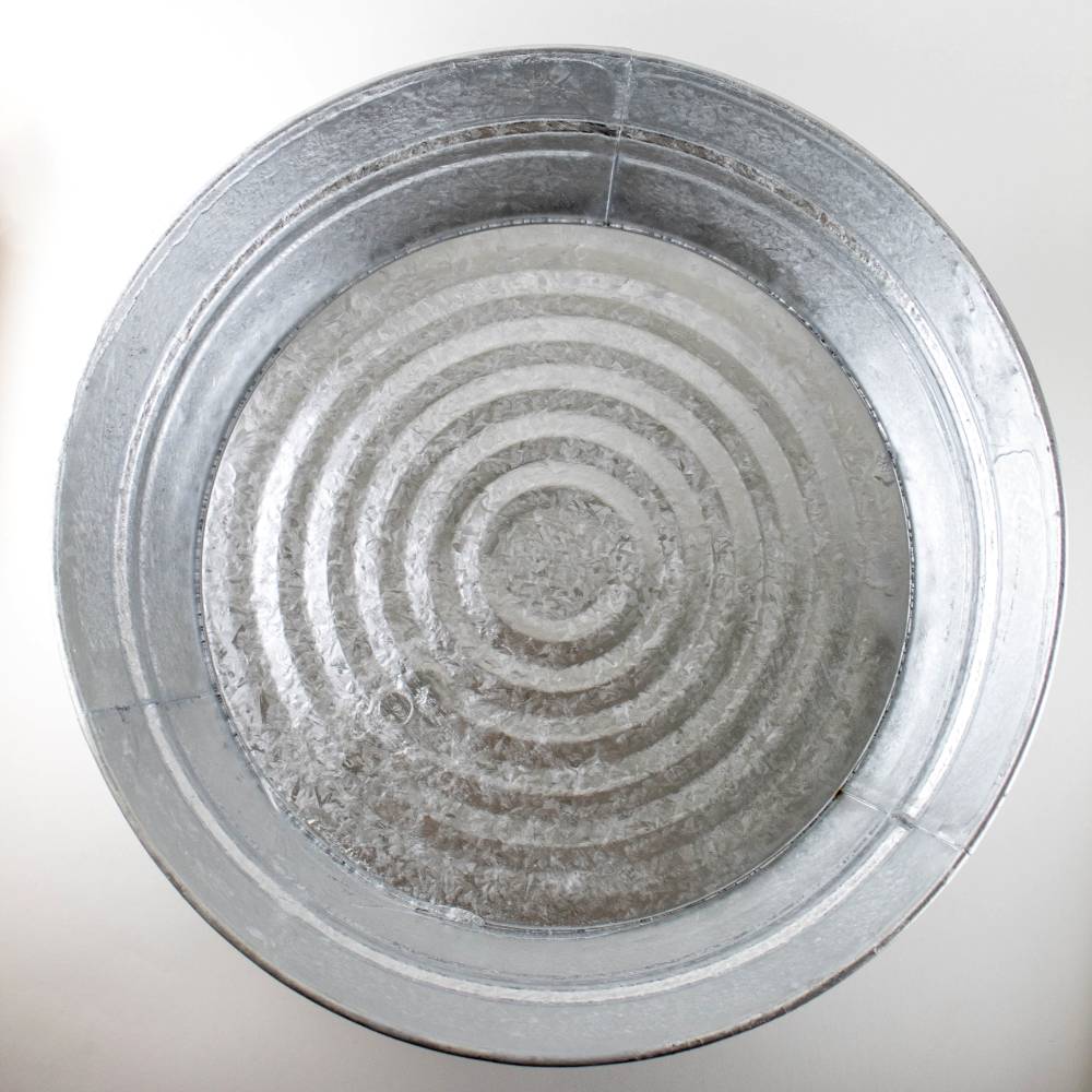 Round handcrafted steel low flat tub with rust-resistant, watertight construction and durable wire handles, suited for Home & Decor, Farm, Garden & Tool, Animal Care, and Household Helpers collections.