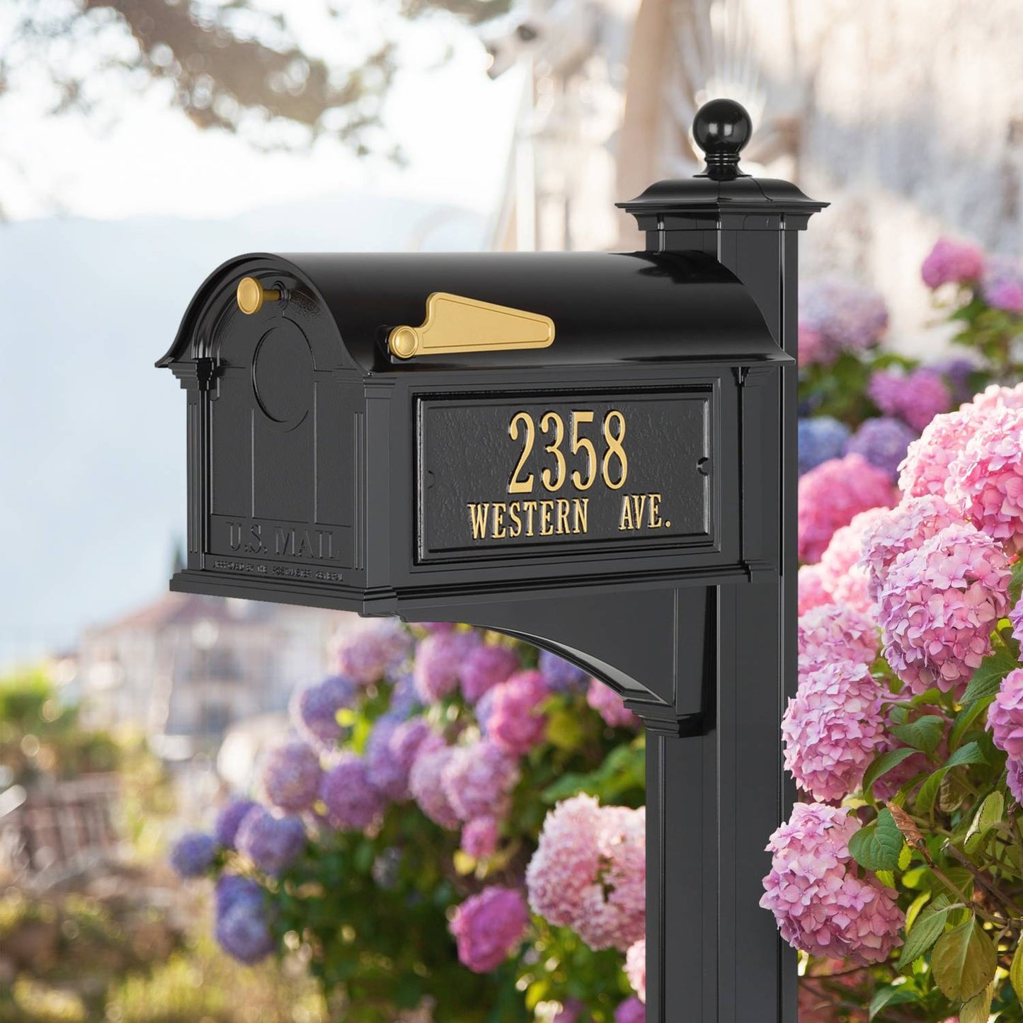 Handcrafted black and gold mailbox mounted on matching post with personalized address, designed to enhance curb appeal, part of Home & Decor, Household Helpers, USA Made, and Best Sellers collections.