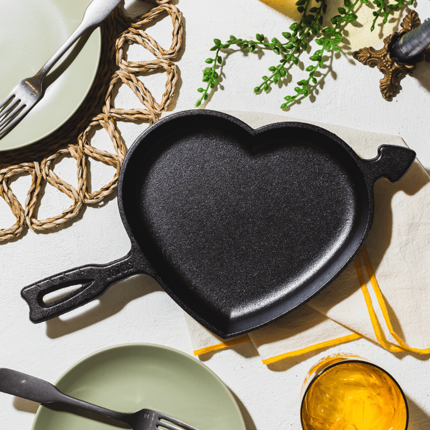Handcrafted cast iron heart-shaped skillet with arrow detail, made in USA, perfect for baking and cooking unique meals, featured in Kitchen & Food, Cookware, Cast Iron, Baking Supplies, USA Made, Best Sellers, and Promo Eligible collections.