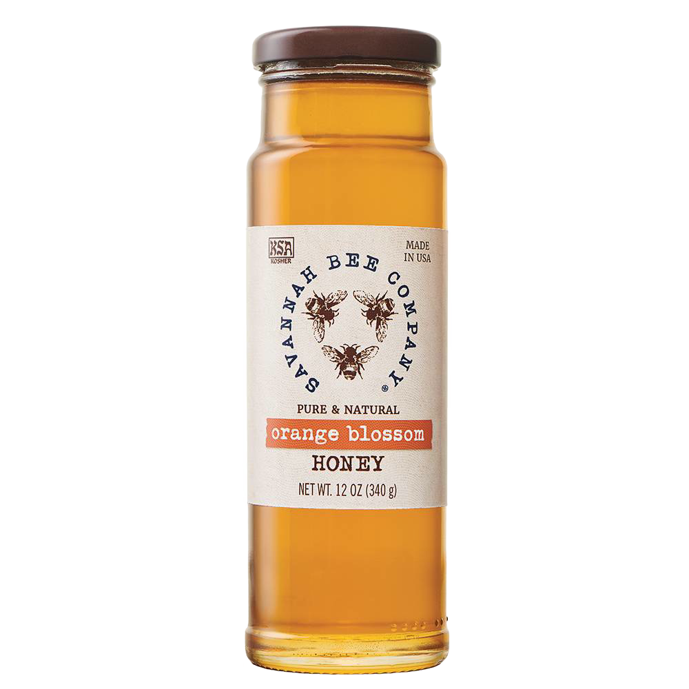 Handcrafted amber orange blossom honey in a clear glass jar with a brown lid, part of Kitchen & Food, Food, Pantry, Best Sellers, and Promo Eligible collections.