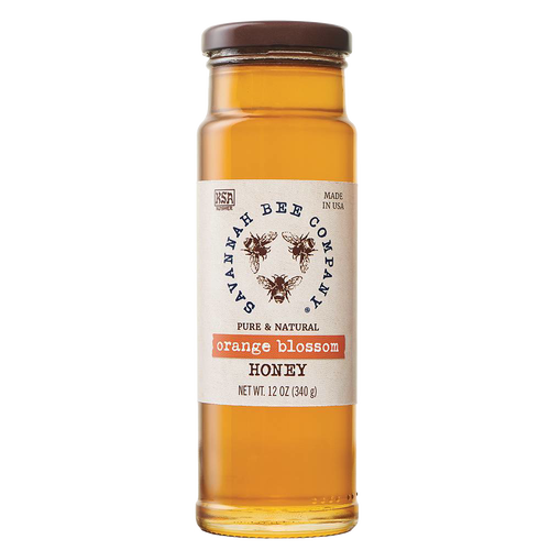Handcrafted amber orange blossom honey in a clear glass jar with a brown lid, part of Kitchen & Food, Food, Pantry, Best Sellers, and Promo Eligible collections.