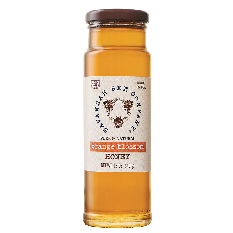 Handcrafted amber orange blossom honey in a clear glass jar with a brown lid, part of Kitchen & Food, Food, Pantry, Best Sellers, and Promo Eligible collections.