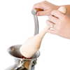 Hands using a smoothly sanded hardwood stumper to safely feed meat into a metal grinder, showcasing handcrafted Amish Made quality in Kitchen & Food and Butchering Supplies collections.