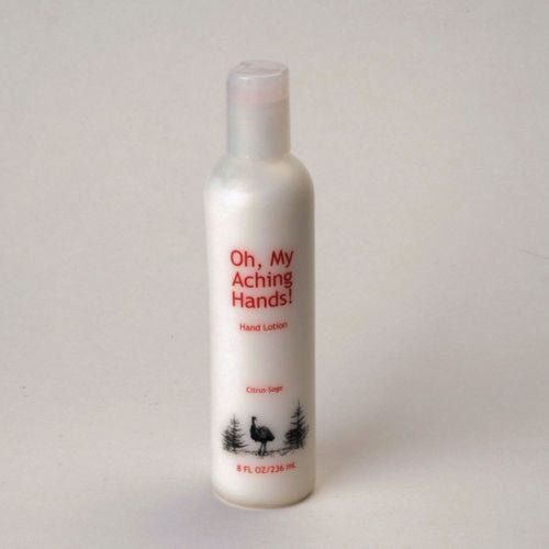 White cylindrical lotion bottle labeled Oh My Aching Hands hand lotion with a citrus-sage scent, featuring simple black tree and bird illustrations, part of Health & Wellness, Balms, Creams and Lotions, USA Made, and Best Sellers collections.