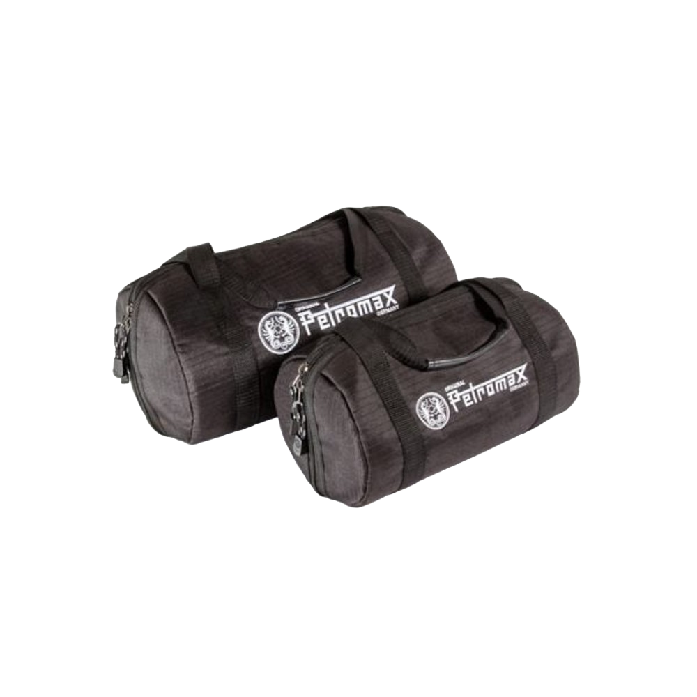 Set of two durable black transport bags made from ripstop fabric, designed for safely carrying fire kettles and other cookware, featured in Kitchen & Food and Cast Iron collections.