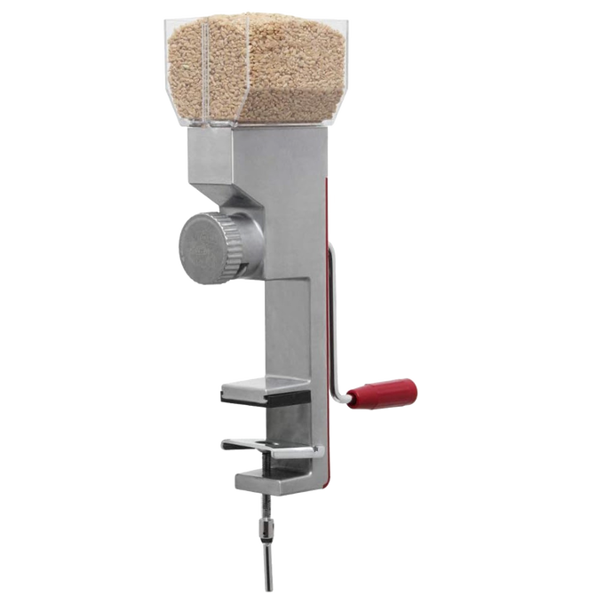 Compact stainless steel grain mill with hand crank and adjustable grind dial, designed for efficient flour grinding from various grains, featured in Kitchen & Food and Grain Mills collections.