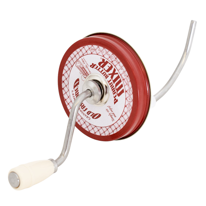 Old fashioned peanut butter stirrer with molded cream-colored handle and red metal lid featuring metal crank, designed for Kitchen & Food, Food Prep, and USA Made collections.