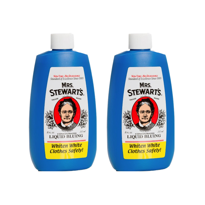 Two blue plastic bottles of Mrs. Stewart’s laundry bluing with white caps, featuring vintage-style labels that promote eco-friendly, non-toxic formula for safely whitening clothes, ideal for Home & Decor and Laundry Supplies collections.