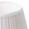 Close-up of a high-quality white cloth pleated lamp shade with soft fabric texture, handcrafted for lamps and lighting, featured in best sellers and accessories collections.