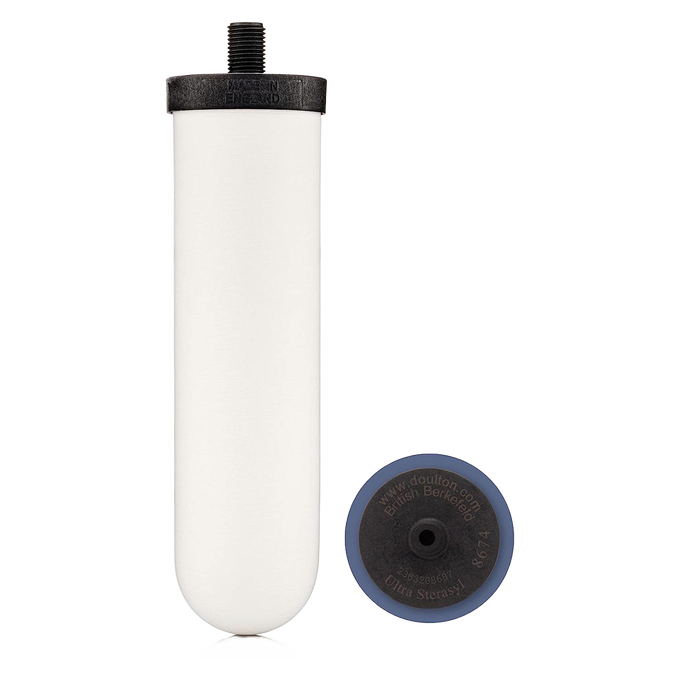 Handcrafted ceramic water filter element with a smooth white body and black top, designed for gravity water filters in Farm, Garden & Tool, Appliances, and Emergency Supplies collections.