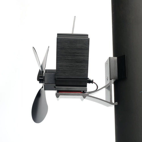 Black heat-driven magnetic stove fan with three blades mounted on a vertical pipe, designed to improve warm air flow, featured in Stoves, Hearth Accessories, Best Sellers, and Promo Eligible collections.