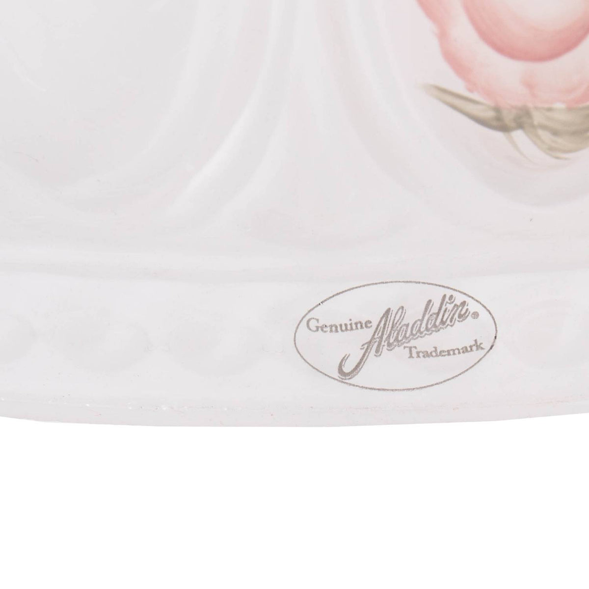 Close-up of a handcrafted glass oil lamp shade with a delicate pink rose pattern and embossed Aladdin trademark, part of Lamps & Lighting and Lamp Shades collections.