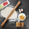 Handcrafted acacia wood rolling pin with fixed handles resting on rolled dough sprinkled with flour, surrounded by eggs, honey with nuts, granola, and sliced fruit, ideal for Kitchen & Food, Cookware, Baking Supplies, Best Sellers, and Promo Eligible collections.